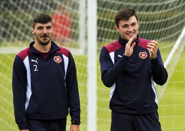 John Souttar, right, is hoping to follow Callum Paterson, left, into the full Scotland squad