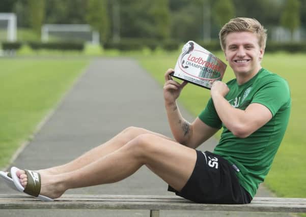Jason Cummings with his Ladbrokes Championship player of the month award