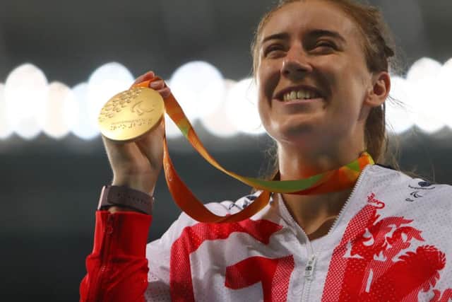 Gold medalist Libby Clegg poses on the podium at the medal ceremony for women's 200m - T11 during day 6 of the Rio 2016 Paralympic Games at the Olympic Stadium on September 13, 2016 in Rio de Janeiro, Brazil. (Photo by Lucas Uebel/Getty Images)