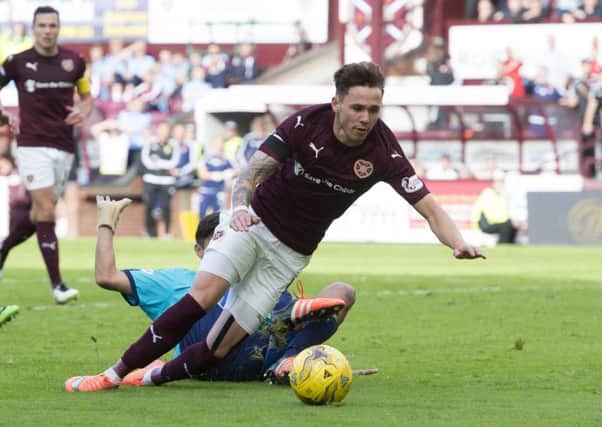 Tommy Wright believes Hearts players, like Sam Nicholson, "maximise any contact". Picture: SNS
