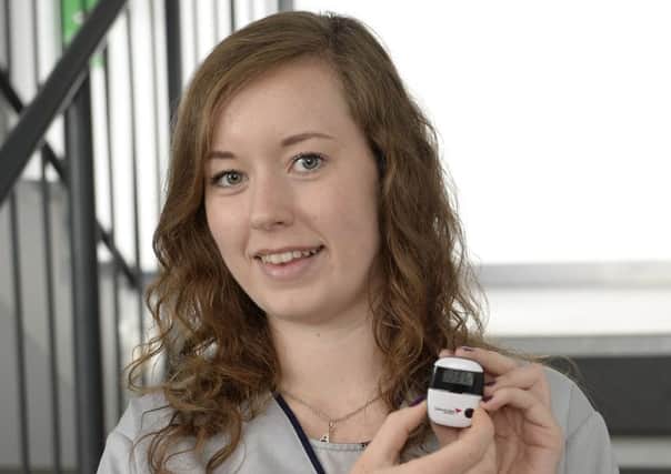 First year adult nursing student Arianne Burton, 18, with her pedometer