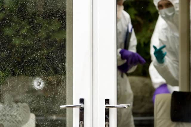 Ratho Station Shooting, Police Forensic officers work on the crime scene. Picture Ian Rutherford