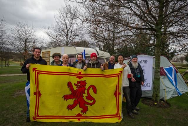 Supporters of the IndyCamp, the peoples vigil for Scotland's independence, gather at their camp near the Scottish Parliament. Picture: Steven Scott Taylor / J P License
