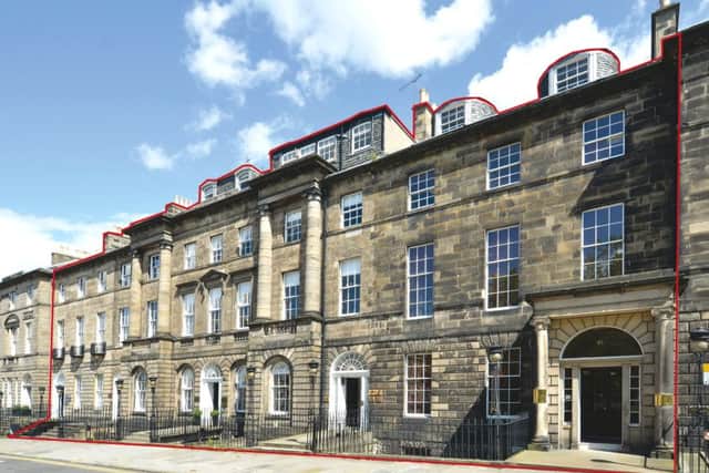 Five townhouses in Charlotte Square are on the market.