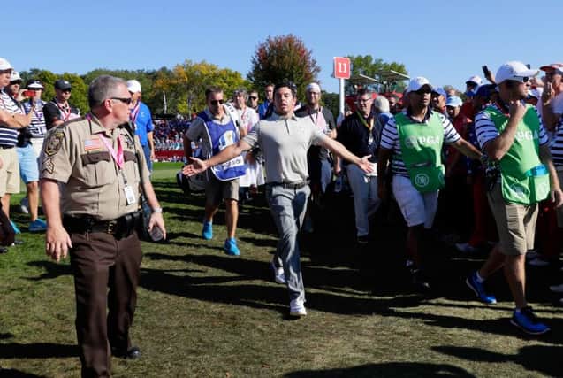 Rory McIlroy reacts to comments from the crowd during the fourballs at Hazeltine. Picture: Getty Images