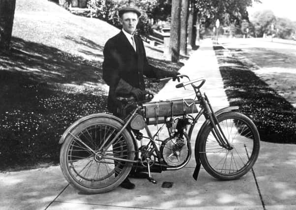 Walter Davidson pictured with one of the first motorcyles devised by his brother Arthur and his childhood friend Bill Harley. PIC Wikipedia