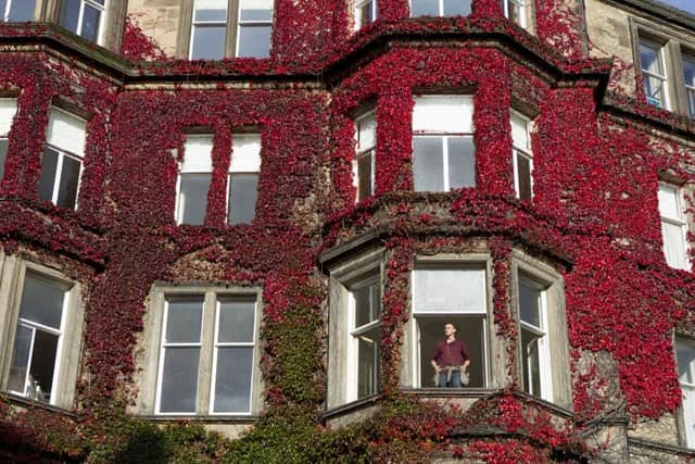 A red ivy covered townhouse in Edinburgh shows of autumn colours. The recent warm weather has meant a slightly later start ot Autumn this year, but the seasonal colours are just now beginning to show. Picture: SWNS