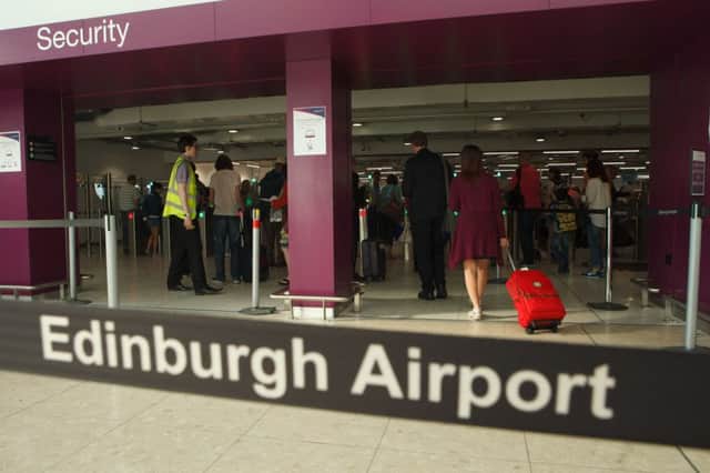 A holiday was almost ruined by staff at the Airport after damage to the passport during chek in. Picture; Toby Williams