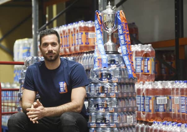 Hibs goalkeeper Ofir Marciano promoted the Irn-Bru Cup at Batley's Bellevue Cash and Carry in Edinburgh. Picture: Greg Macvean