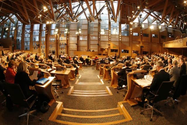 EU regulations mean the Scottish Parliament is facing a Â£1m lighting bill for the lighting seen at the rear of the chamber. Picture: contributed