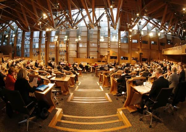 EU regulations mean the Scottish Parliament is facing a Â£1m lighting bill for the lighting seen at the rear of the chamber. Picture: contributed