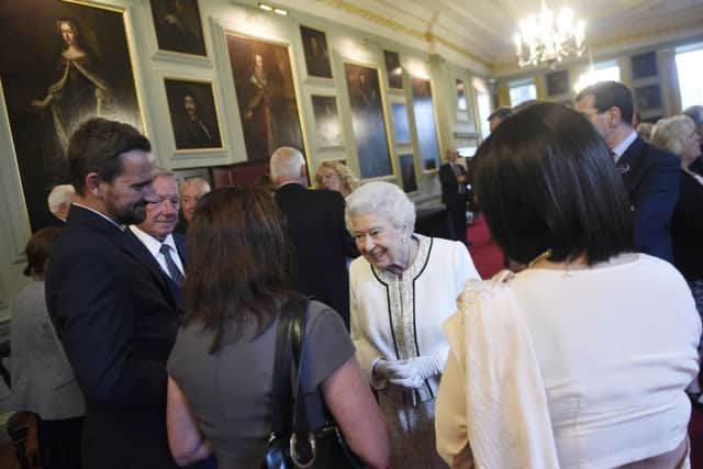 The Queen and The Duke of Edinburgh host a reception in the Great Gallery of Holyrood House. Picture: Greg Macvean/TSPL