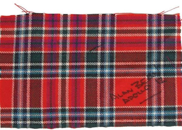 The piece of tartan taken by US astronaut Alan Bean on the 1969 Apollo 12 voyage to the moon. PIC Contributed.