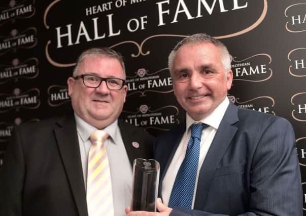 HYDC chairman Calum Robertson welcomes John Colquhoun into the Hearts Hall of Fame
