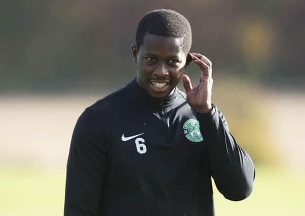 Hibs midfielder Marvin Bartley will be free to face Dunfermline tomorrow after his red card against Raith was downgraded to a yellow. Pic: SNS