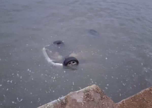 Two cars plunged into the sea. Picture Yanoosh Dee.