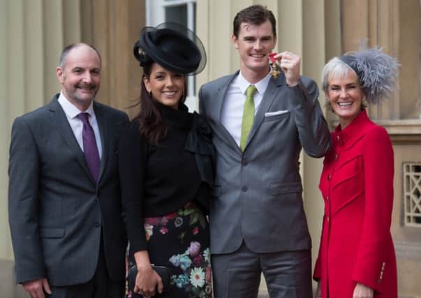 Jamie Murray with his wife Alejandra Gutierrez, mother Judy and father William  after he received his Officer of the Order of the British Empire (OBE).  Picture: Stefan Rousseau/Getty Images