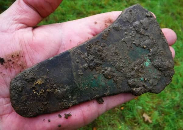An early Bronze Age axe head - one of three found by metal detectorist Derek McLennan. It is thought the find is around 4,000 years old. PIC Contributed.