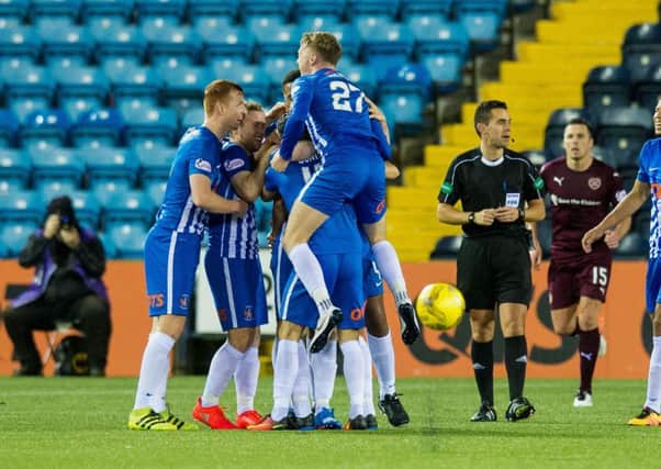 Don Cowie looks on after Kilmarnock scored their second goal on Wednesday night. The midfielder admits Hearts will need to raise their level significantly against Inverness tomorrow. Pic: SNS