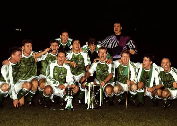 Hibs' players celebrate with the Skol Cup in 1991. Row from left, Gordon Hunter, Keith Wright, Gareth Evans, Willie Miller, Pat McGinley, Murdo MacLeod, Graeme Mitchell, Brian Hamilton, Mickey Weir. 
Back three, David Beaumont, Neil Orr and John Burridge. Pic: SNS