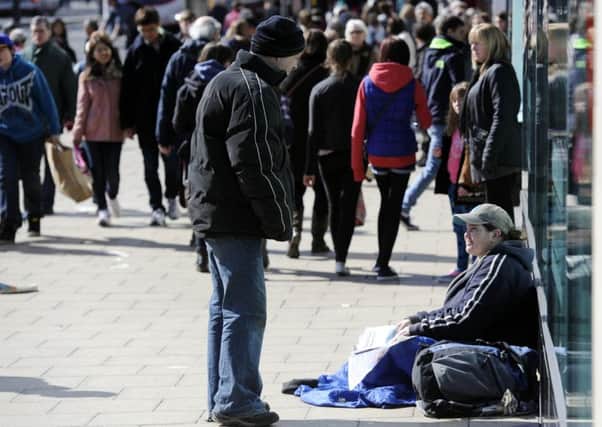 An increase in begging has prompted concerns about the city's services for homeless people. Picture; Greg Macvean