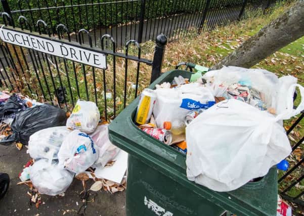 Overflowing bins have caused widespread anger across the Capital. Picture: Ian Georgeson