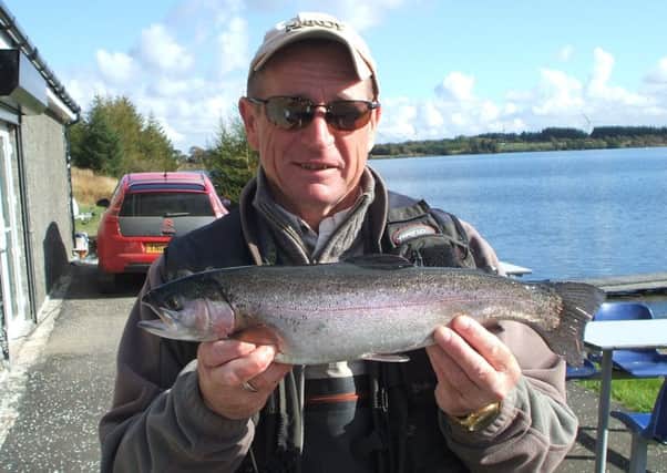 Iain Earle of Alloa with a 3lb rainbow taken on a Yellow Owl at the Black Loch