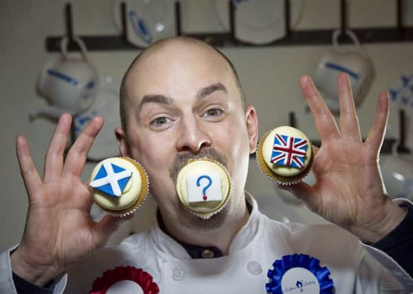 Owner of Cuckoo's Bakery Graham Savage with the independence referendum cup cakes. Picture: Scott Taylot
