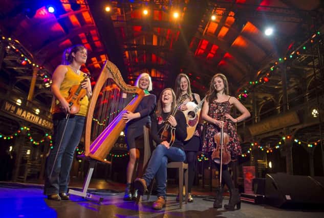 Pictured (L/R): Jeana Leslie (fiddle), Fraya Thomson (harp), Laura-Beth Salter (mandolin), Jenn Butterworth (guitar) and Laura Wilkie (fiddle) of Celtic Connections