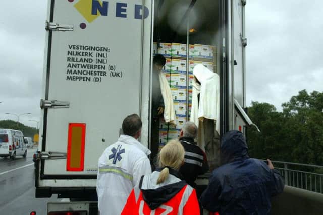 Rescue workers discover illegal asylum seekers in the back of a lorry. Picture: GETTY
