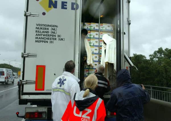 Rescue workers discover illegal asylum seekers in the back of a lorry. Picture: GETTY
