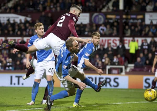Callum Paterson shows his strength and desire as he causes havoc among the St Johnstone defence to head home Hearts second and earn a vital point