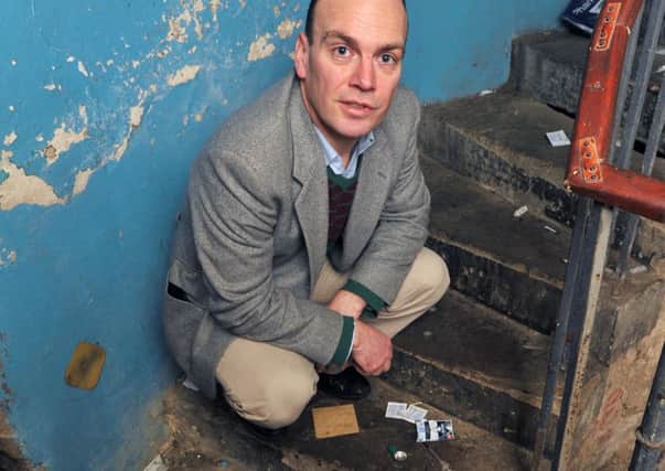 Jim Orr pictured in a stairwell in Rankeillor Street that has become a shooting gallery for legal highs. Picture: Ian Rutherford