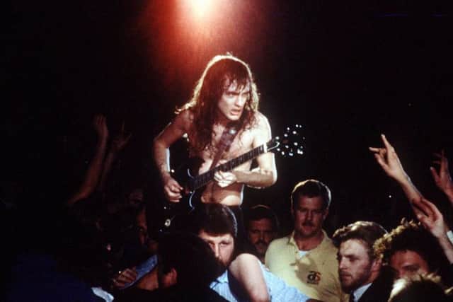AC/DC guitarist Angus Young during concert. Pic: Rex Features