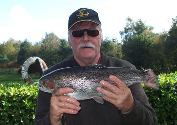 Yours truly: Stuart Fraser from Mayfield with a 4lb rainbow taken on a white cat at Allandale Tarn