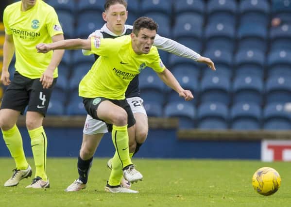 Hibs midfielder John McGinn has been playing this season with a piece of calcified bone at the top of his ankle