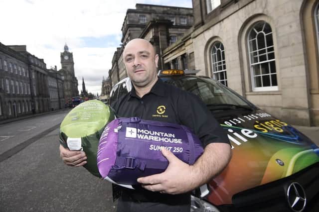 Taxi driver David Storie who buys sleeping bags for homeless people on Princes Street and is encouraging other taxi drivers to do the same.