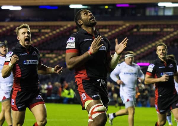 Edinburgh's Viliame Mata celebrates after scoring the first try. Picture: Paul Devlin/SNS