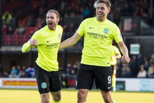 Martin Boyle, left, celebrates with Grant Holt. Picture: SNS