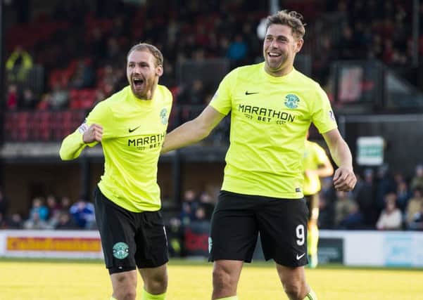 Martin Boyle, left, celebrates with Grant Holt. Picture: SNS