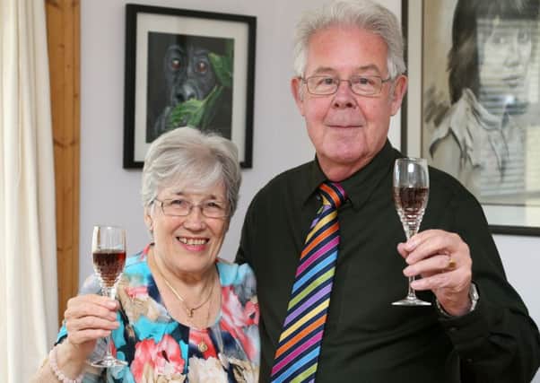 Ian and Laura Buchanan toast their years of happiness. Picture: Gordon Fraser