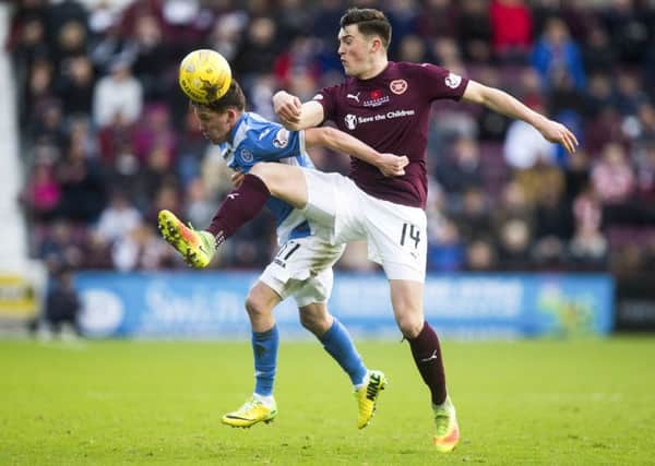 John Souttar is pleased with the way he has matured at Hearts and learned how to cope with physical play