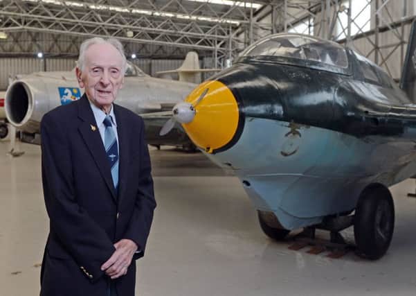 Eric Brown is reunited with the Messerschmitt Me 163B-1a Komet at the National Museum of Flight in East Fortune in 2015. Picture: Neil Hanna