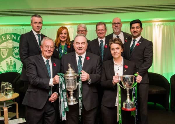 Amit Moudgil, back row far right, and Frank Dougan beside him have been Hibs' fan representatives on the board for the past two years. Pic: Ian Georgeson