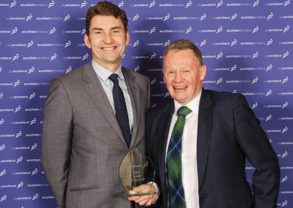 Neil Scott of JogScotland Haddington with Brian Whittle, who presented the leader award. Picture: Bobby Gavin