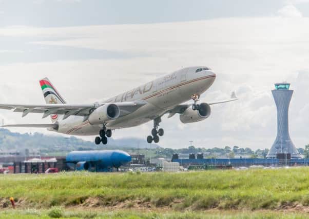 A plane takes off from Edinburgh. Picture: Ian Georgeson