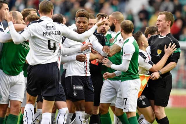 Hibs and Falkirk players clash as Bairns midfielder Tom Taiwo is sent off after only 24 minutes at Easter Road