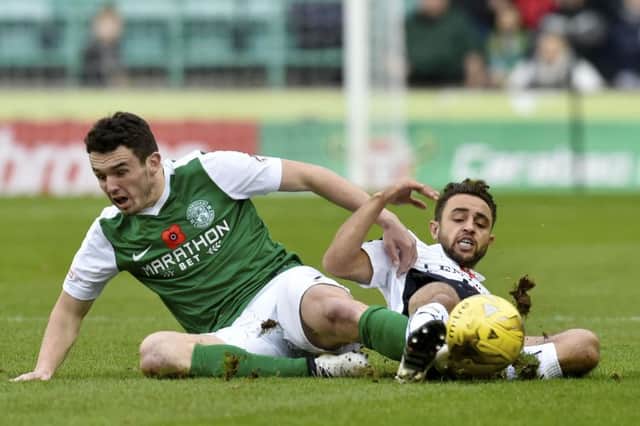 John McGinn, left, was in the thick of the action against Falkirk yet again, with Tom Taiwo, right, sent off for a challenge on him. Pic: SNS