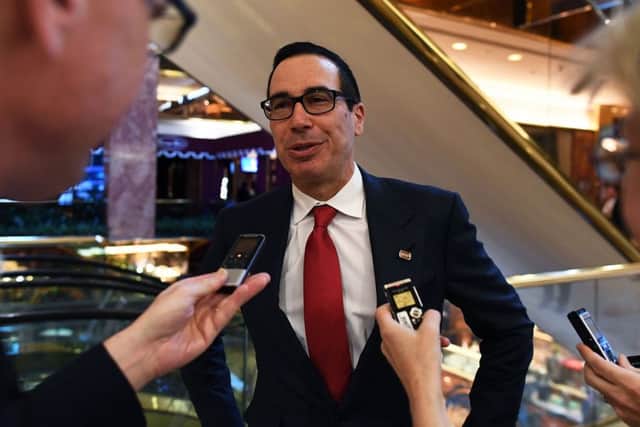 US President-elect Donald Trump adviser Steven Mnuchin speaks to reporters at the Trump Tower in New York. Picture; Getty