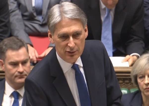 Philip Hammond would the the archetypal reliable bank manager, if we still had such people. Picture: PA